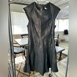 Vintage Burning Torch Black 100% genuine leather dress.